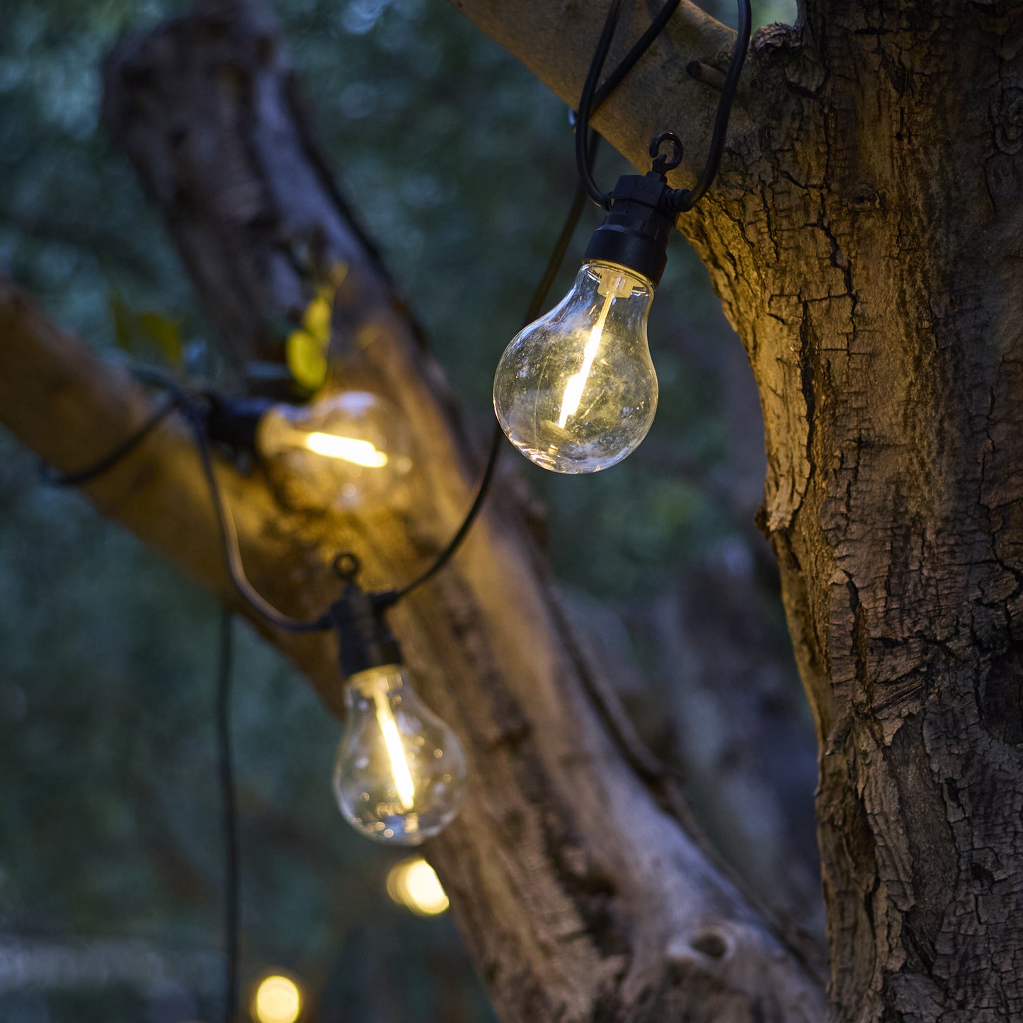 Guirlande lumineuses extérieur raccordable 20 globes transparents LED blanc chaud dimmable PARTY CLEAR HYBRID 8m solaire et sur secteur 13m