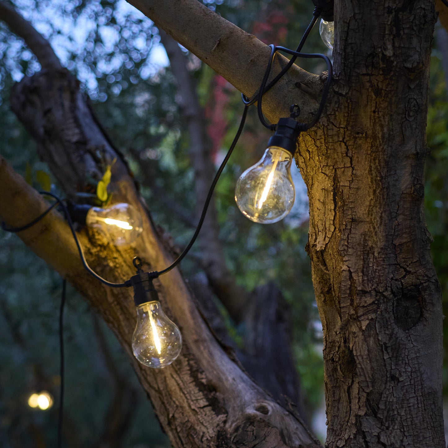 Guirlande lumineuse extérieur 10 globes transparents raccordable LED blanc chaud PARTY CLEAR HYBRID 7.50m solaire et sur secteur