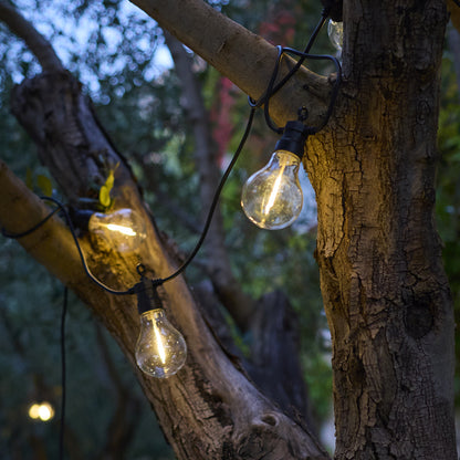 Guirlande lumineuse extérieur 10 globes transparents raccordable LED blanc chaud PARTY CLEAR HYBRID 7.50m solaire et sur secteur